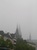 The spires of Cologne Cathedral seen through the mist